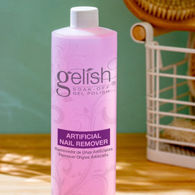 Gelish artificial nail remover cotton-pad application for skin-friendly hydration.