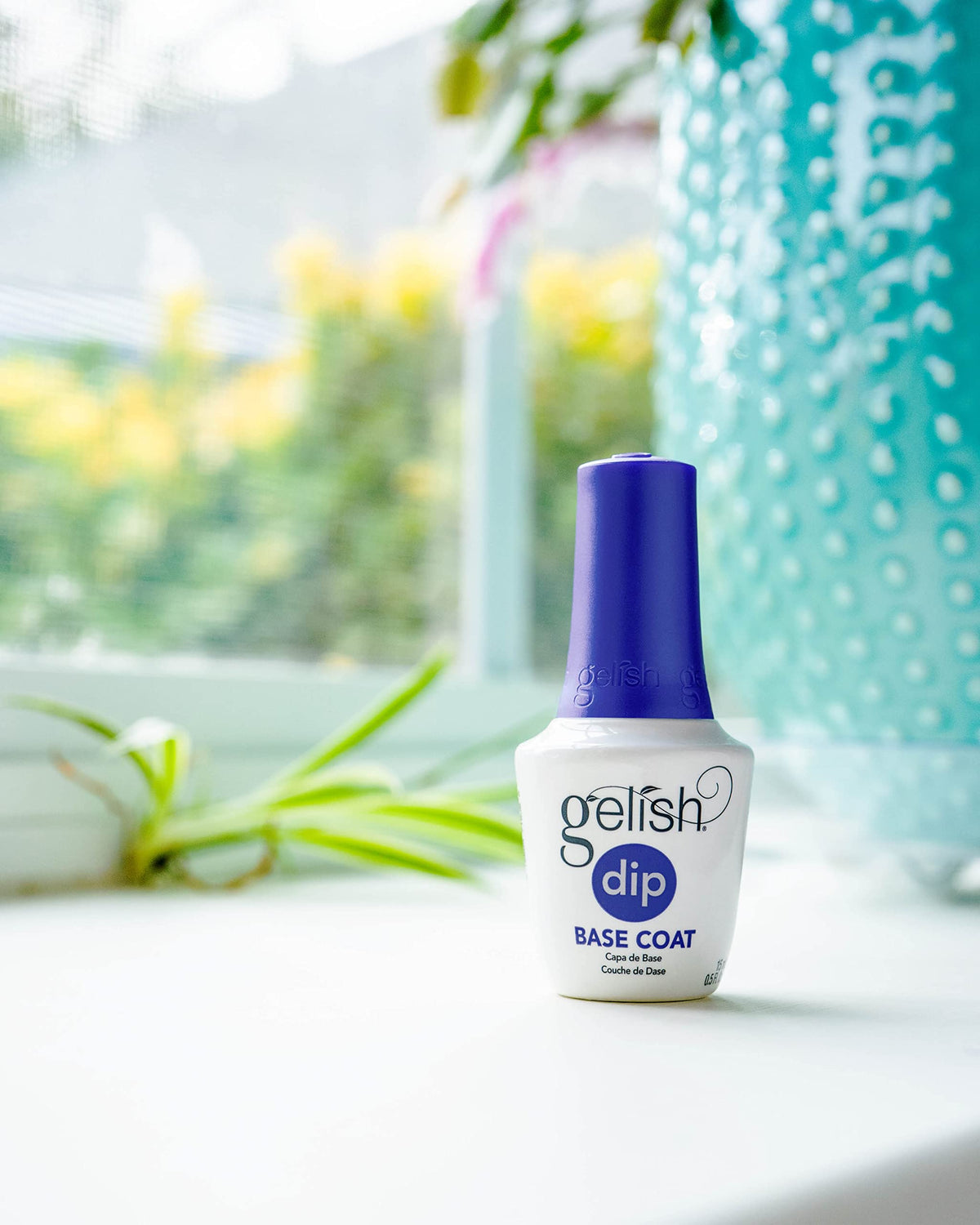 Gelish Dip Basix Kit brush-restorer bottle keeps brushes clean and reusable.
