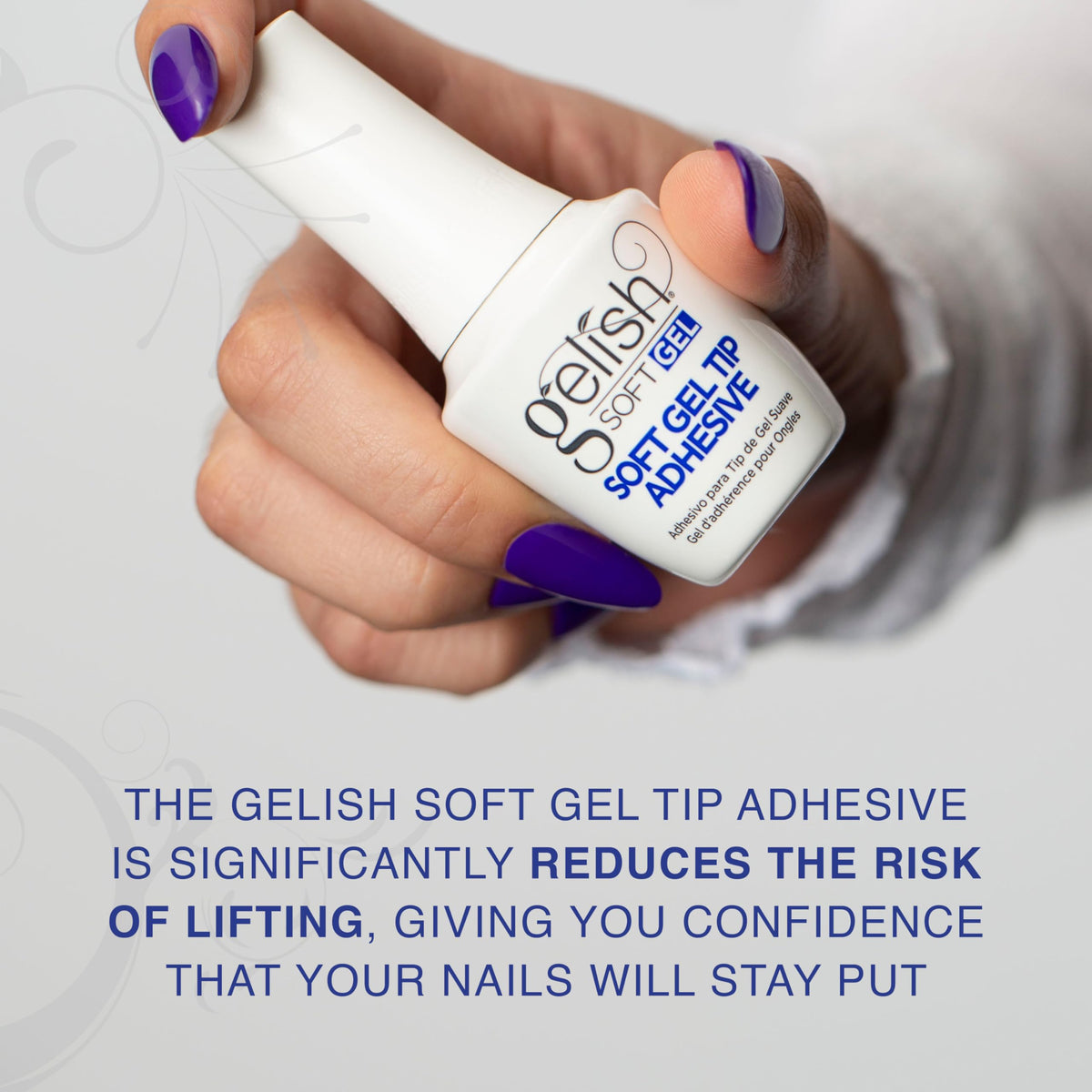 Close-up of Gelish adhesive applying smoothly to soft gel tips with bubble-free finish.