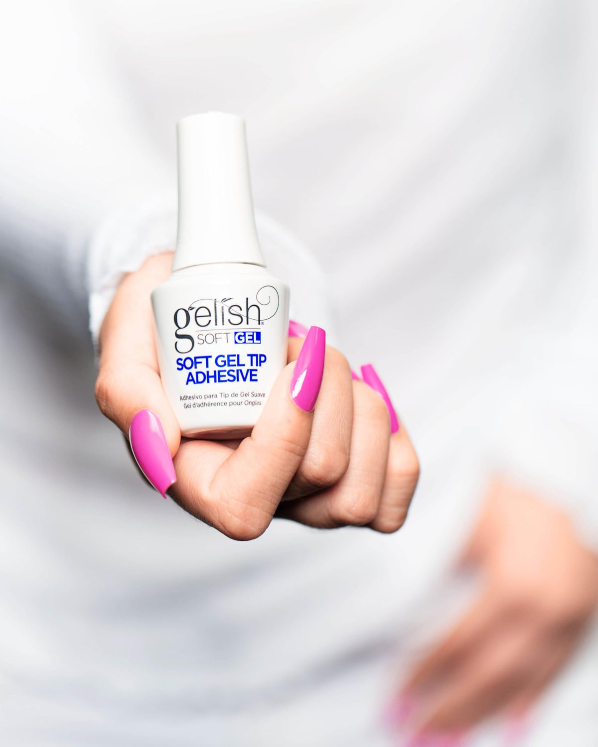 Nozzle and cap of Gelish adhesive for precise, controlled dispensing.