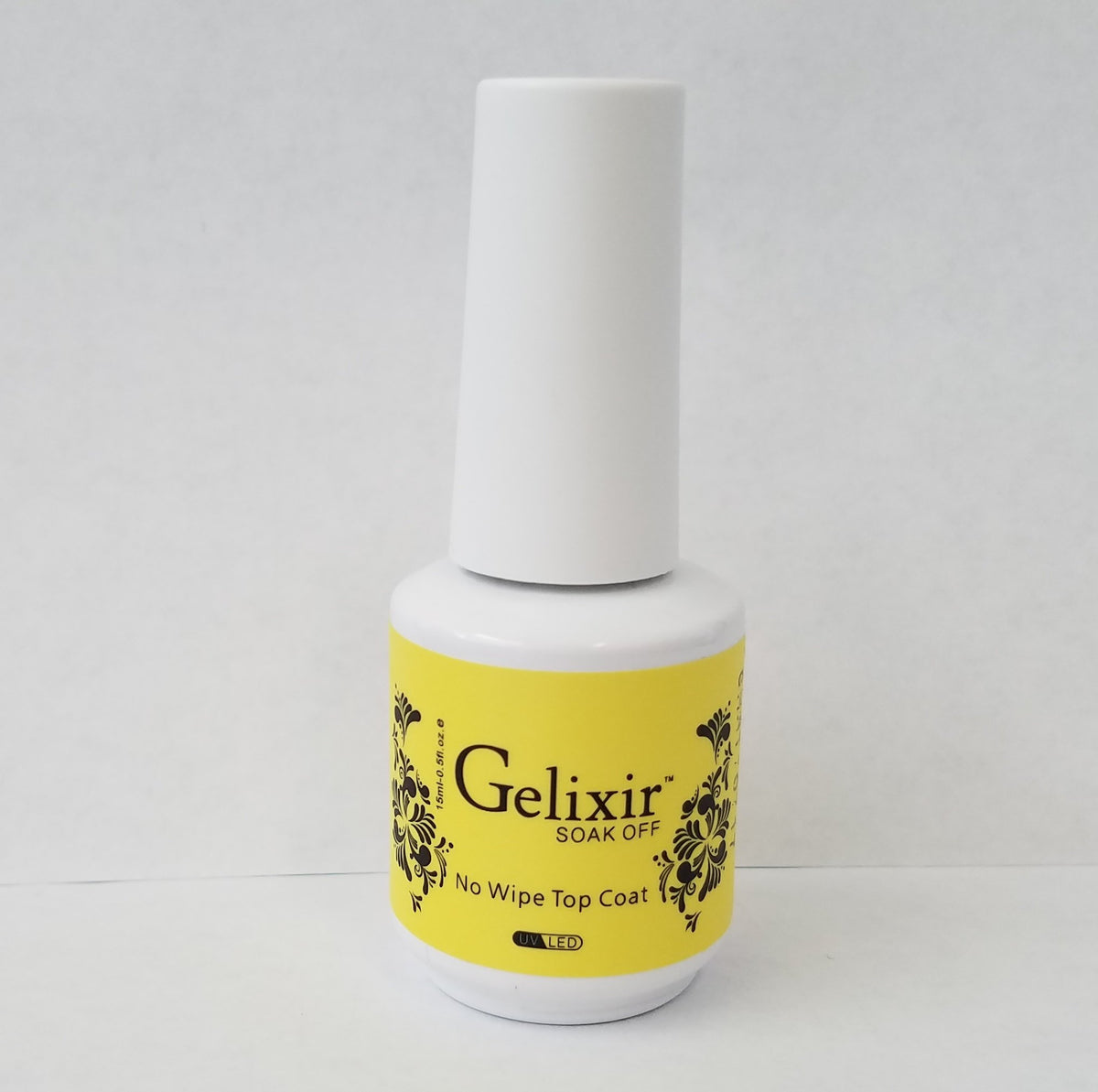 Gelixir no-wipe top coat swatch shows fast cure and shine.