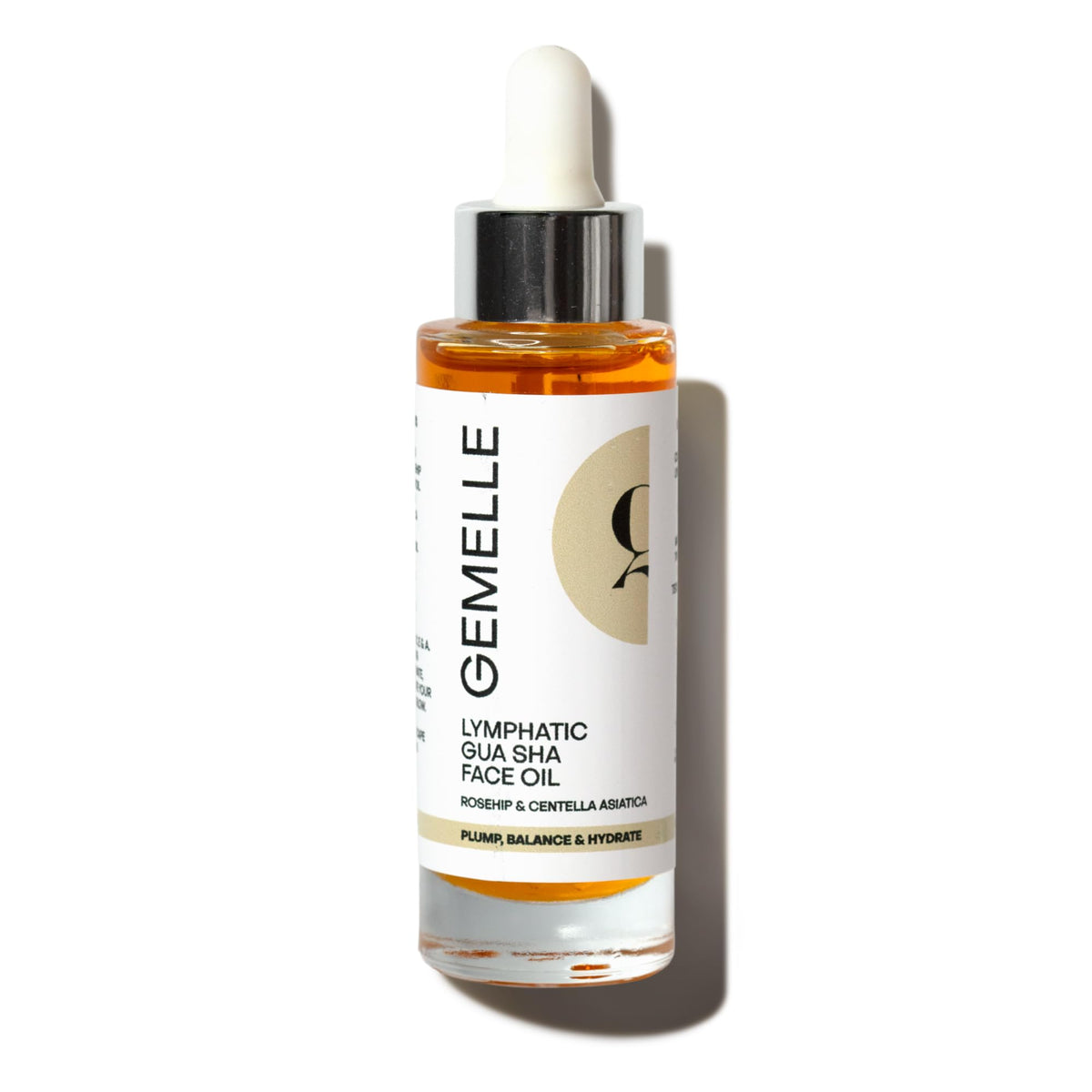 Gemelle Lymphatic Gua Sha Face Oil bottle pour for smooth glide and hydration.