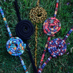 General handmade dreadlock accessory reflects careful craftsmanship.