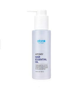 Generic A.t.o.m.y Hair Essential Oil bottle pouring for lightweight anti-frizz shine