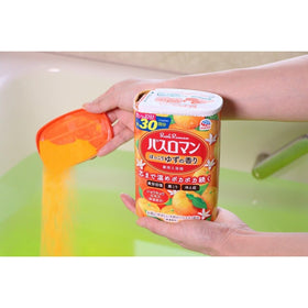 Dissolving Generic Bath Salt Yuzu in water releasing citrus aroma.