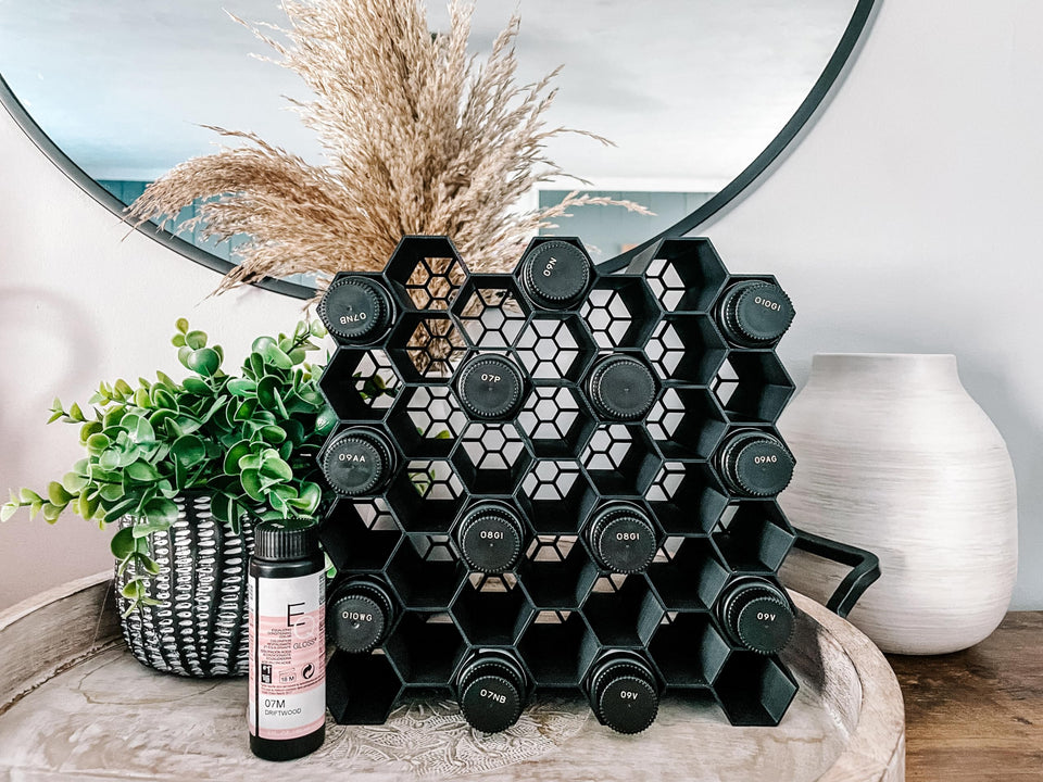 Generic HexRacks 42-bottle section keeps salon dyes neatly organized.