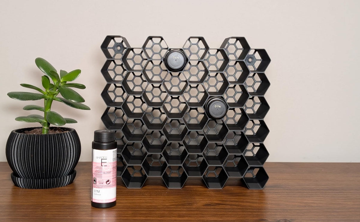 Generic Markvicka hexagon wall mount organizer keeps Shades EQ bottles within easy reach.
