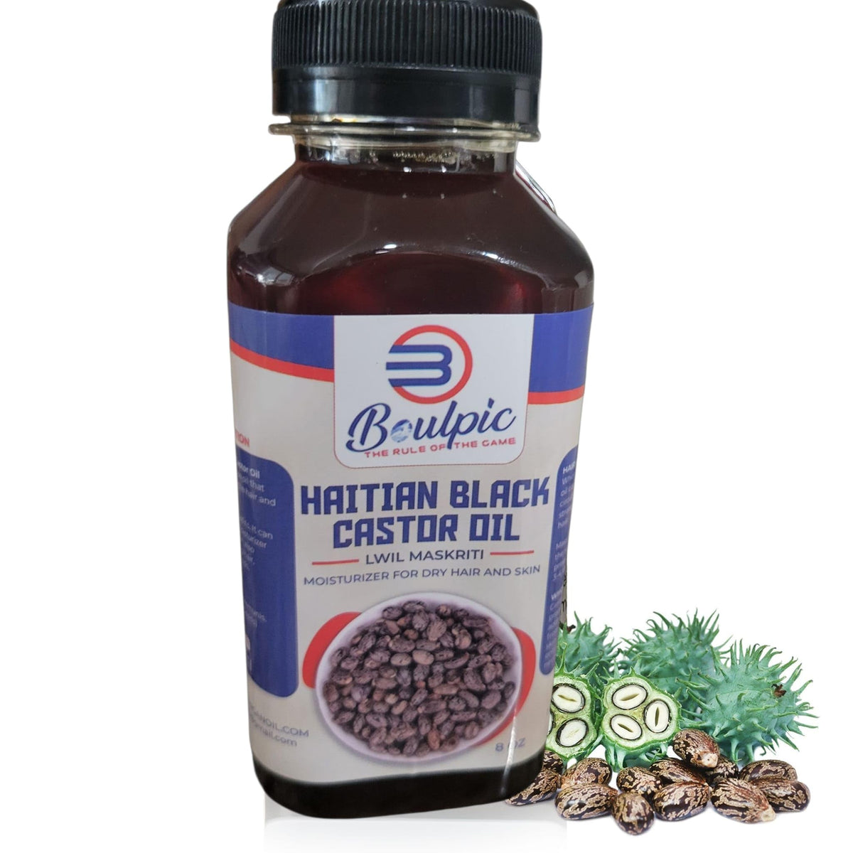 Generic Meme Haitian Black Castor Oil bottle on wood, ideal for hair nourishment and authentic purity.