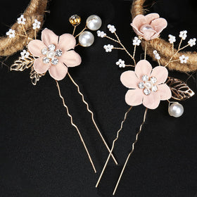 Generic mother-of-the-bride accessory with subtle pink florals and rose-gold base