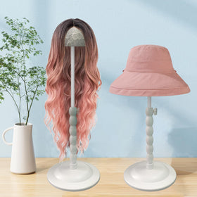 Generic wig stand demonstrating adjustable height for different wig lengths.