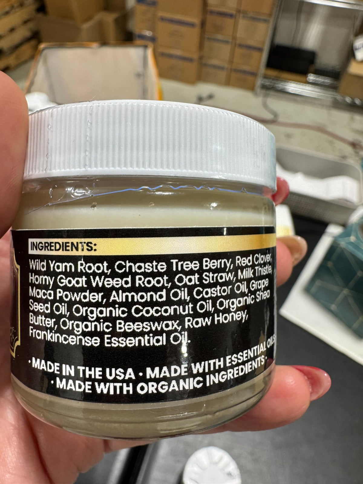 Close-up of Genesis Solomon’s Secret cream texture showing non-greasy absorption.