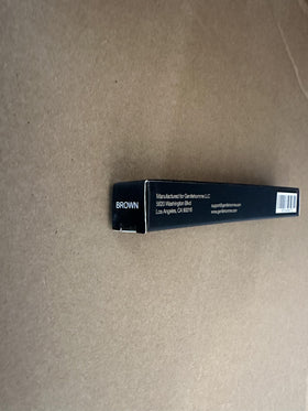 Gentlehomme Brow Pencil in use for quick grooming on the go.