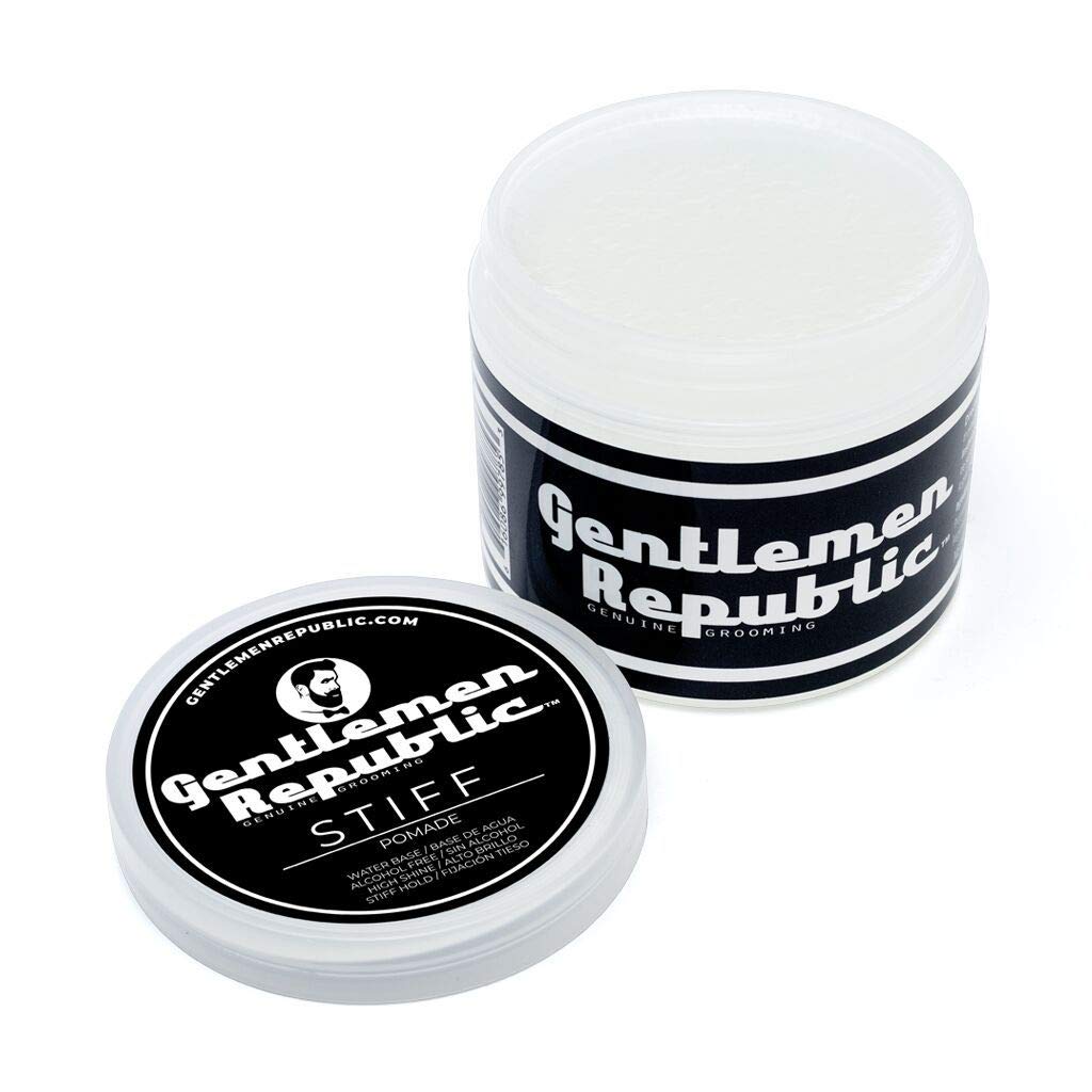Gentlemen Republic applying pomade for precise styling control.