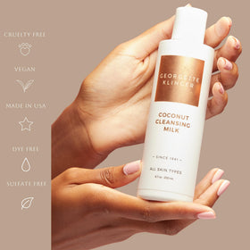Silky lather forms as coconut cleansing milk blends into skin