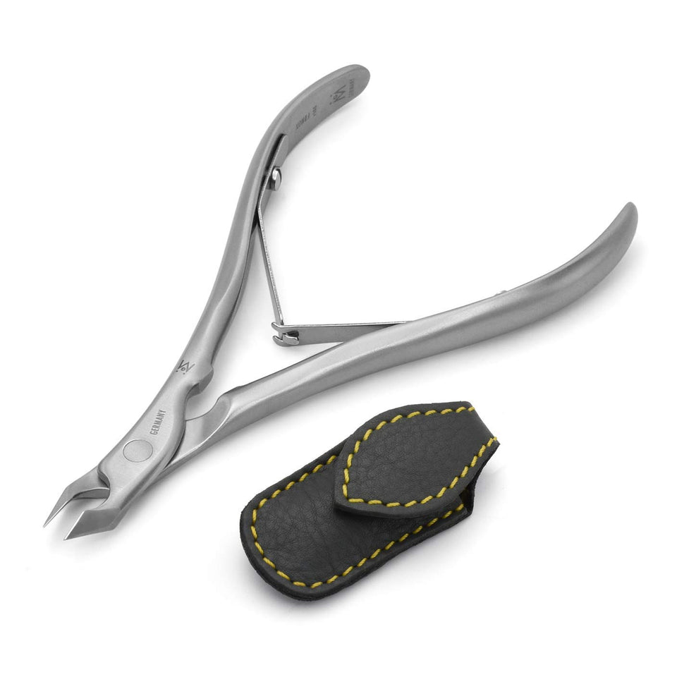 GERMANIKURE tapered cuticle trimmer close-up blade for precise grooming.