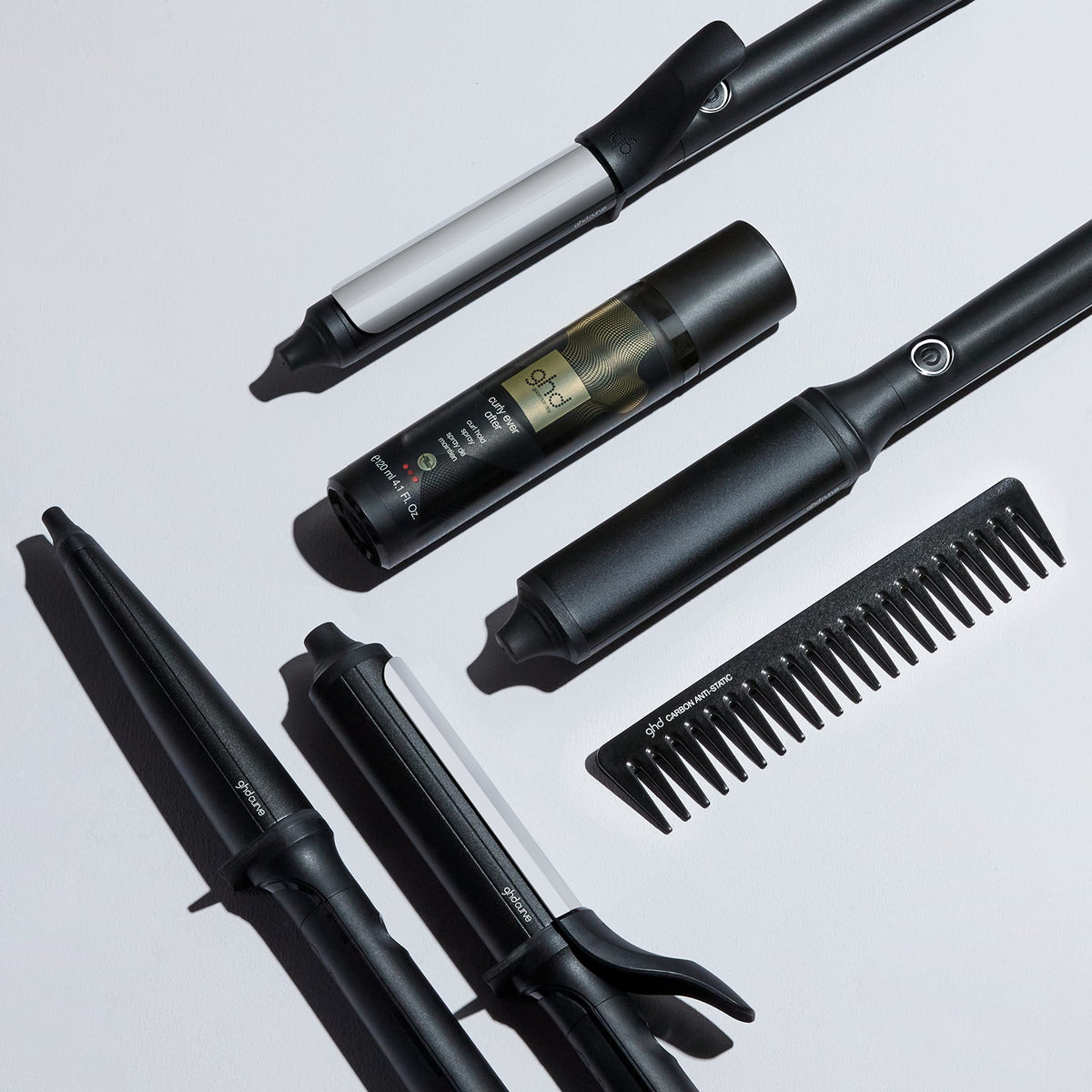 ghd Curly Ever After Curl Hold Spray styled curls show enhanced definition and smooth finish.