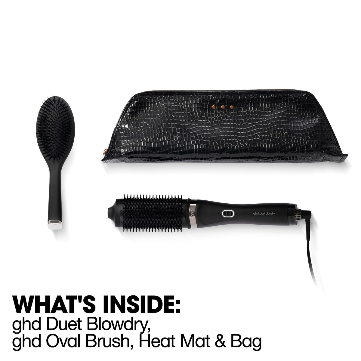 ghd Duet oval dressing brush close-up for precise styling and frizz control.