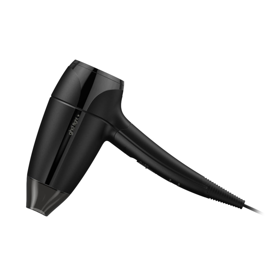 ghd Flight+ travel dryer folding handle for ultra-compact packing.