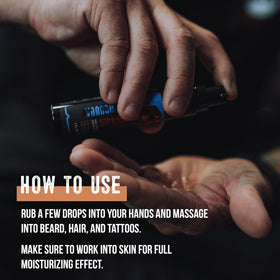 GIBS Bush Master oil on skin hydrates and supports tattoo care.