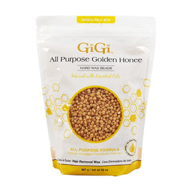 GIGI All Purpose Golden Honee wax beads in jar for precise, comfortable waxing.