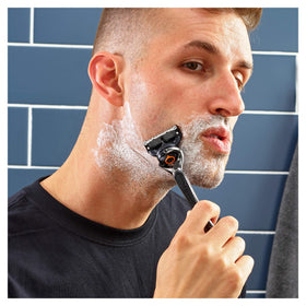 Gillette ProGlide refill pack with four blades and a precision trimmer for hard-to-reach areas