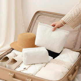 Travel-friendly Gilprop waffle bag in white ready for toiletries and cosmetics.