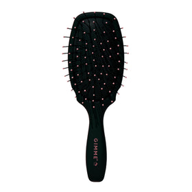 GIMME mini travel detangler for fine hair with compact design for on-the-go grooming.