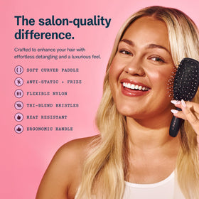GIMME mini detangler featuring heat-resistant bristles for hot styling touch-ups.