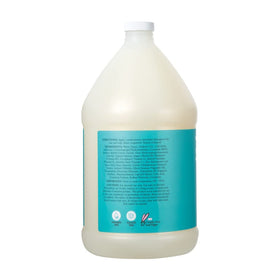 Ginger Lily Farms Argan Oil Shampoo pouring into hand demonstrating luxurious lather