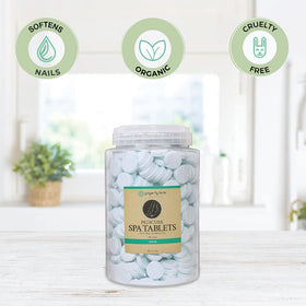 Ginger Lily Farms Pedicure Spa Tablets with tea tree oil for skin nourishment during foot soaks.