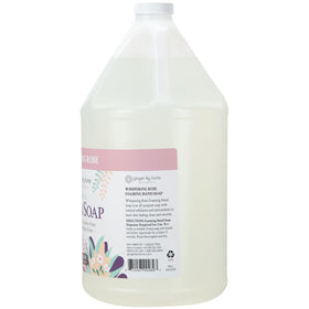 Ginger Lily Farms Botanicals Whispering Rose label highlights floral fragrance.