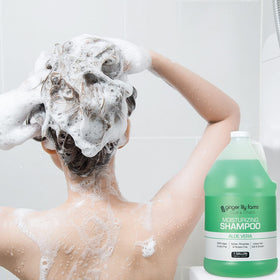 Ginger Lily Farms Club & Fitness shampoo in a commercial spa setting.