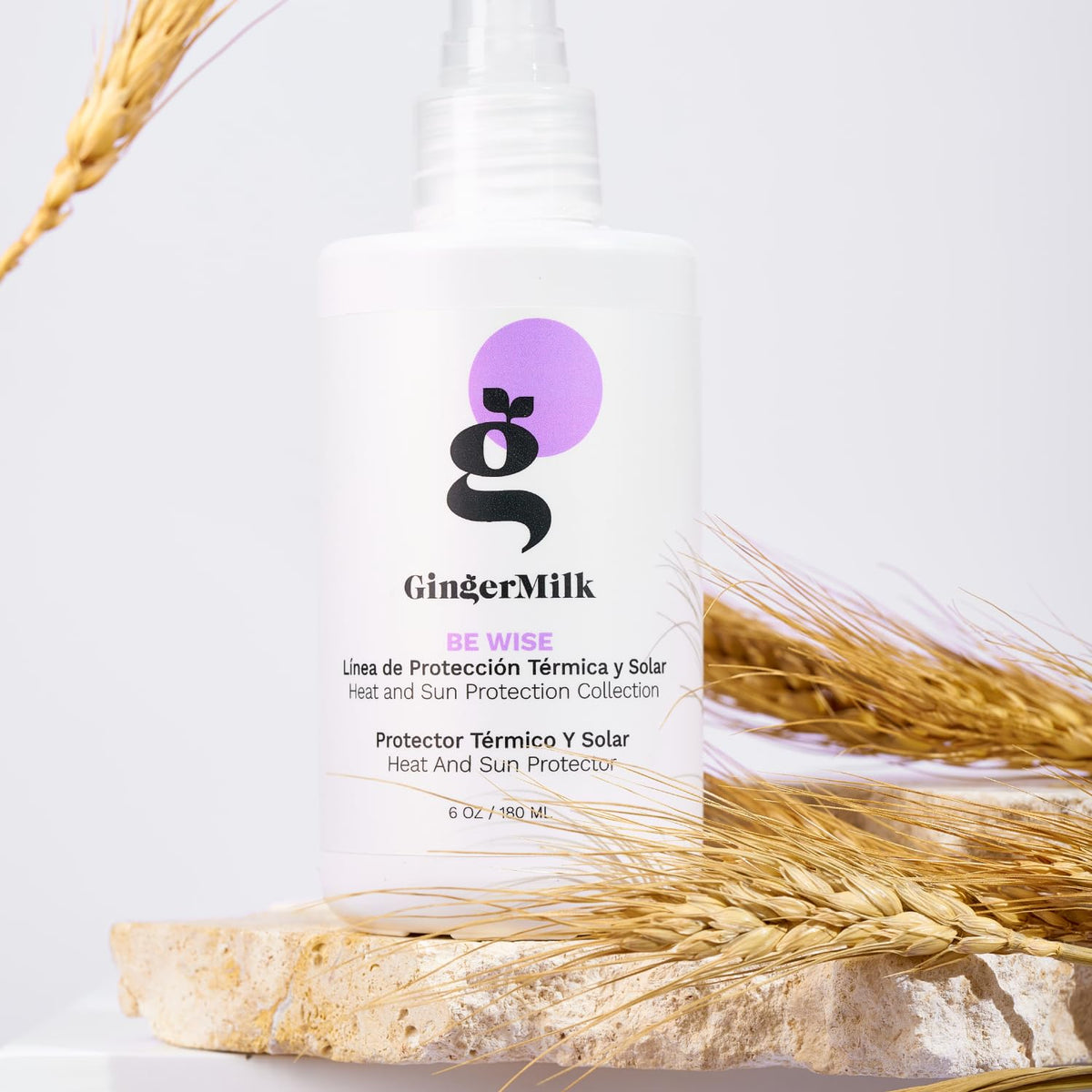 Blow-drying scene with Ginger Milk for controlled heat styling.