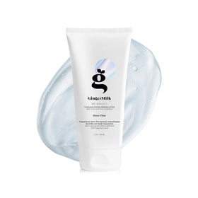 Ginger Milk Hair Gloss bottle pour shows sleek packaging and shine-ready formula.