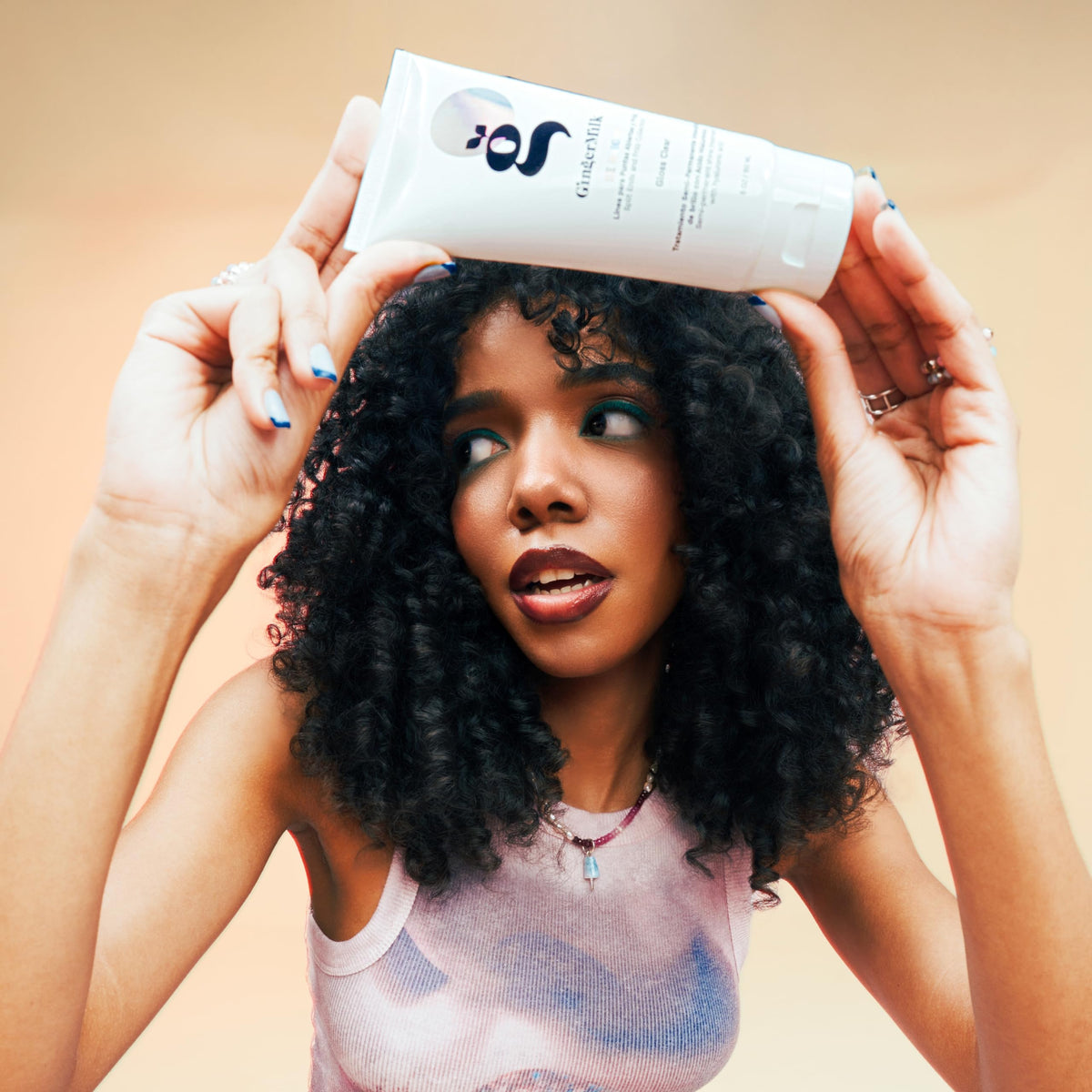 Ginger Milk Hair Gloss color enhancement adds subtle vibrancy.