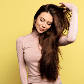Ginger Milk Natural Care SOS ingredient close-up featuring ginger and biotin highlights