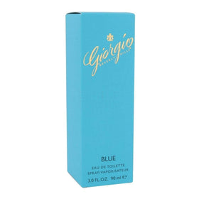 Giorgio Blue bottle sits on driftwood background evoking fresh warmth.