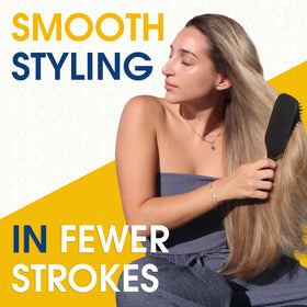 Giorgio detangling paddle brush with silicone cushion for flexible support.