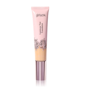 Girlactik Luminous Tint Foundation bottle close-up showing a hydrated, natural glow.