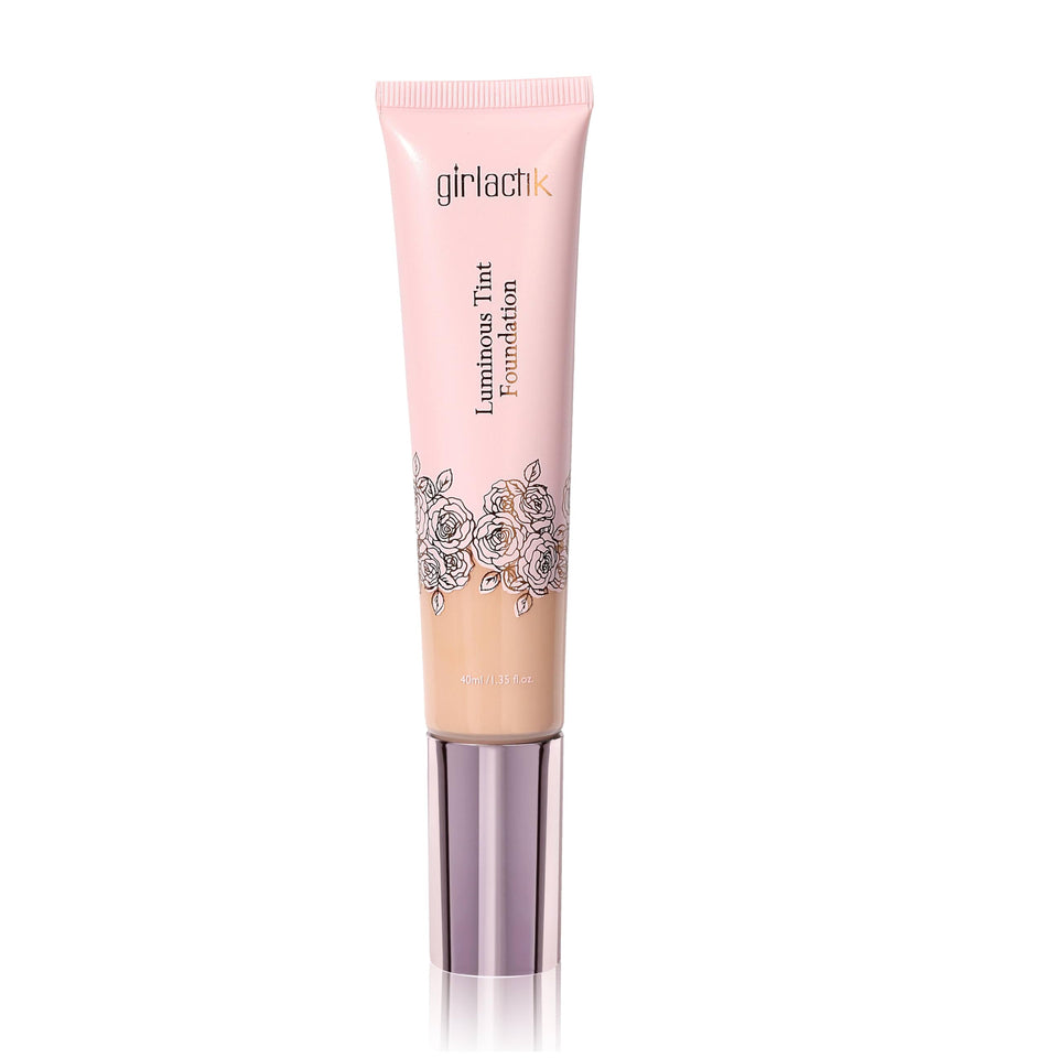 Girlactik Luminous Tint Foundation bottle close-up highlighting hydrating formula for a dewy finish.