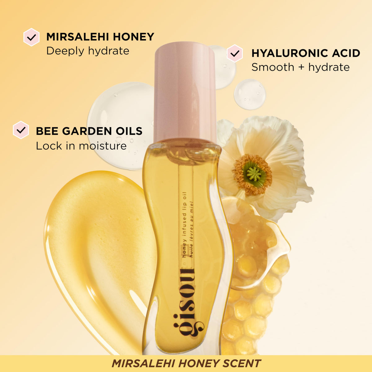 Gisou Honey Gloss Sets hair perfume application spray from arm's length.