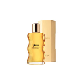 Gisou Honey Infused Body Oil Gold bottle pouring for deep hydration
