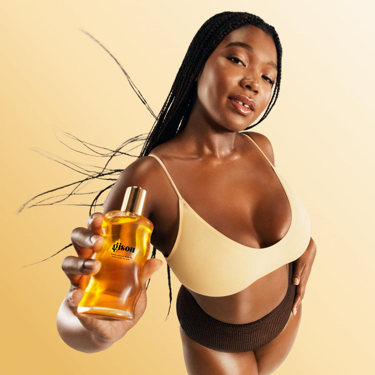 Gisou Honey Infused Body Oil quickly absorbs for non greasy use