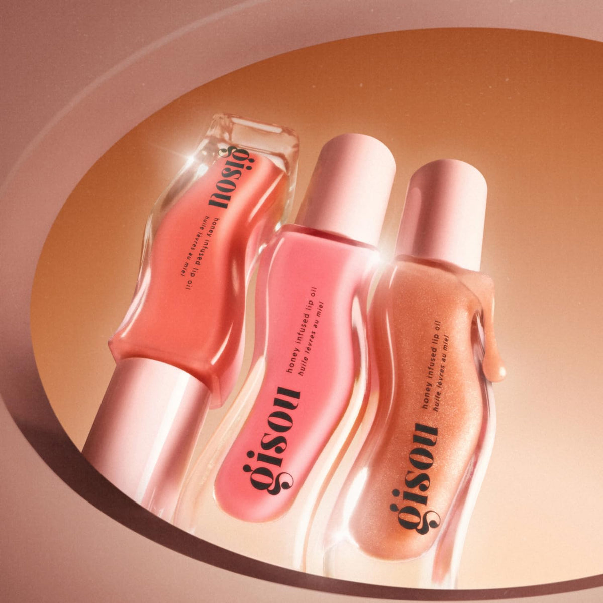 Gisou Lip Oil Watermelon Sugar travel-sized bottle fits in a bag
