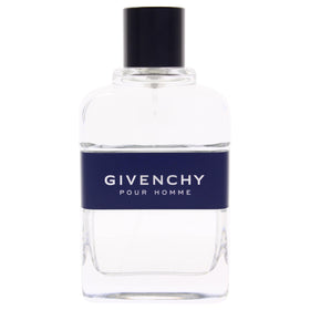 Givenchy Blue Label bottle closeup cap, highlighting spray nozzle and refined detailing