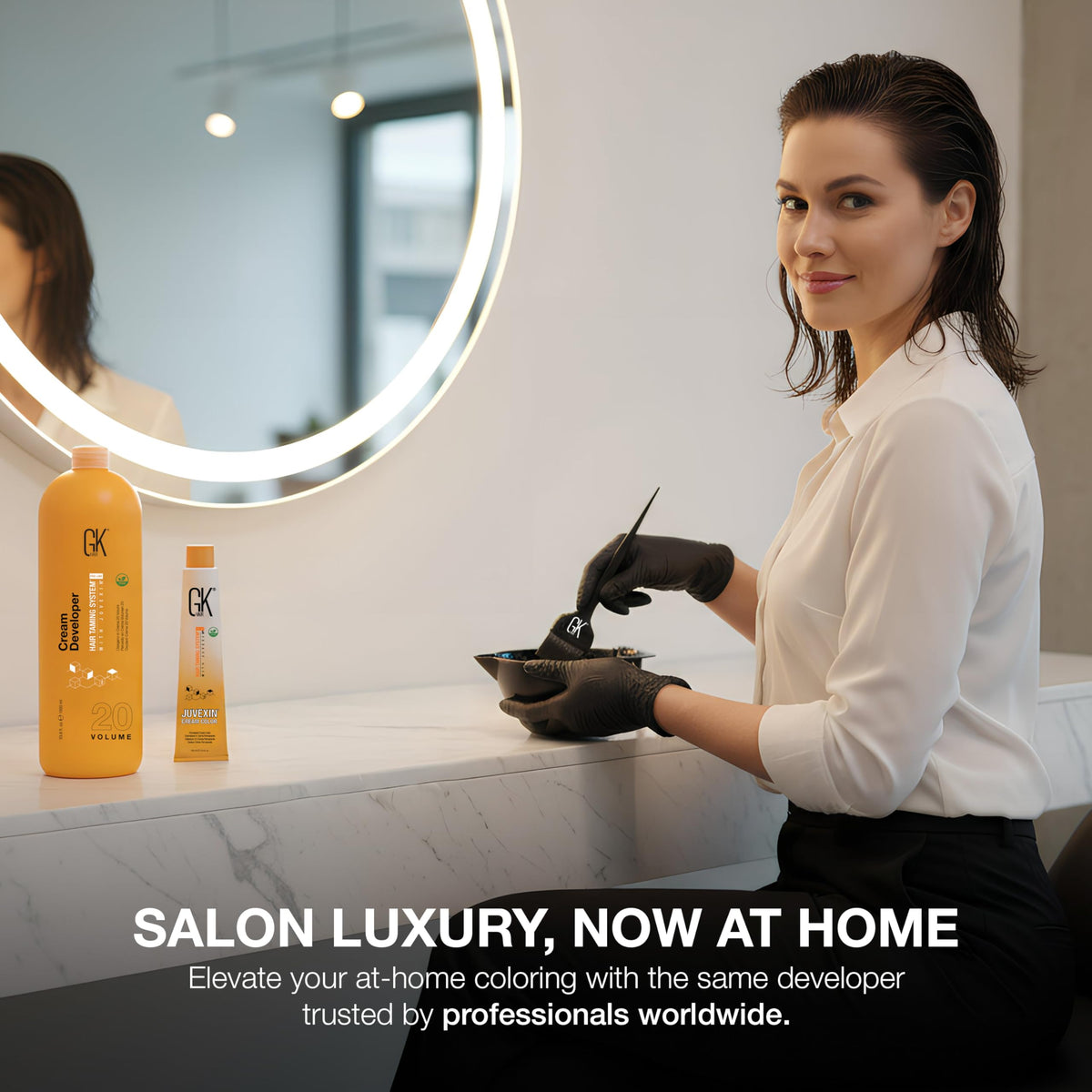 GK Hair color cream and developer setup ready for professional hair bleaching and toning.