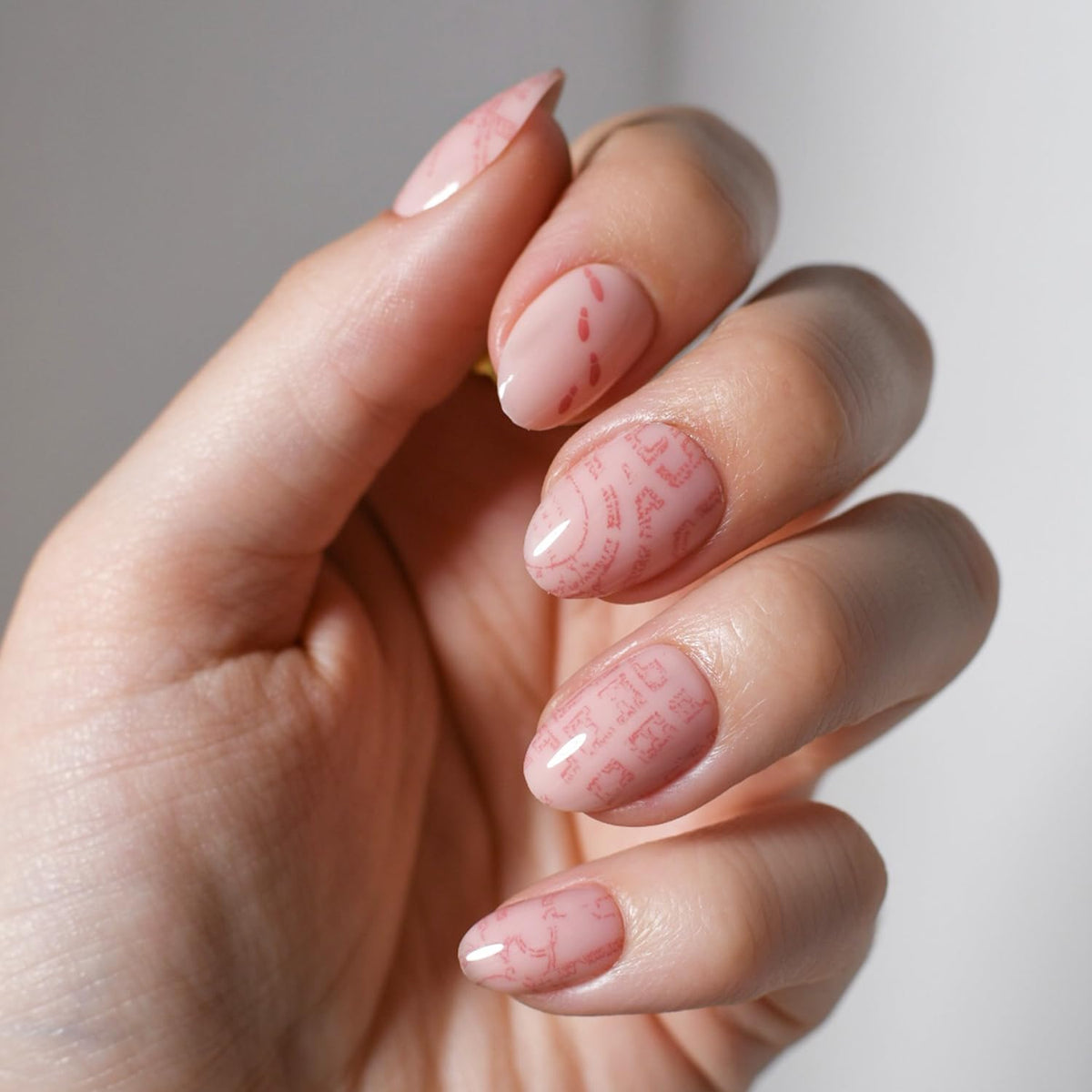 Glamnetic Marauders Map nails with semi transparent graphic for versatile styling.