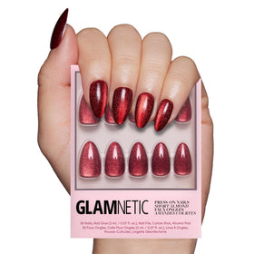 Glamnetic Ruby Slipper nails closeup showcasing velvet red sparkle for a bold long-lasting look