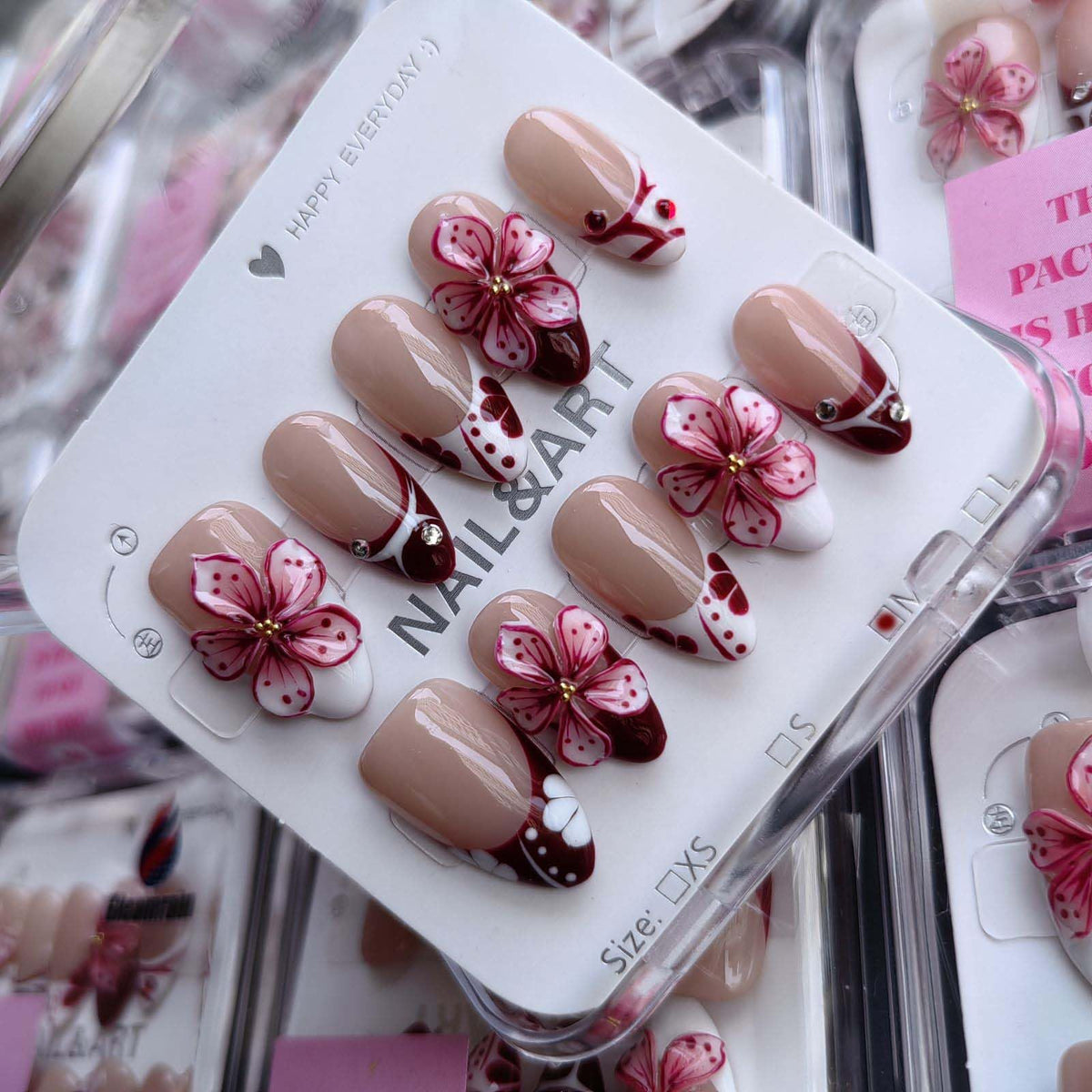 Gleamrain almond press-on nails with French tip and 3D flowers for everyday elegance.
