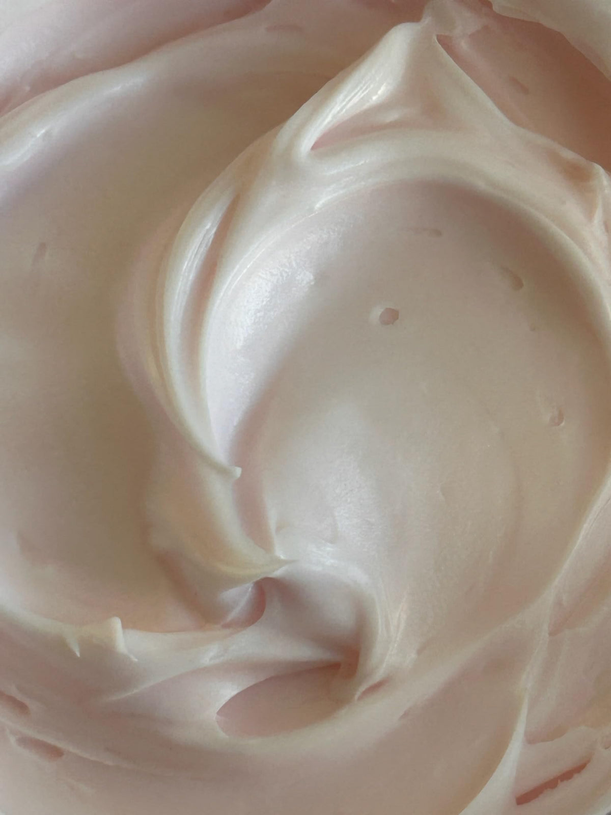 Glimmer Wish whipped texture shows fast absorption with a non-greasy finish.